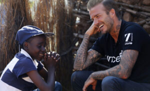 UNICEF Goodwill Ambassador David Beckham meets Sebenelle, 14, in Makhewu, Swaziland