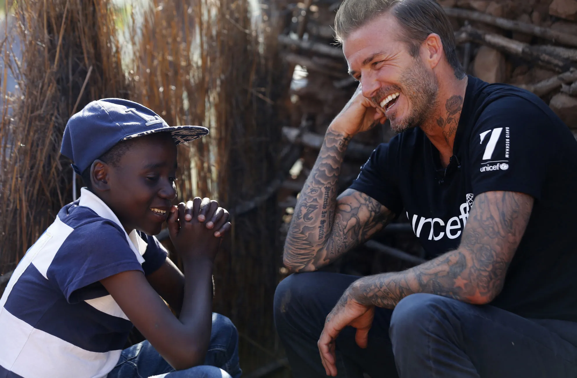UNICEF Goodwill Ambassador David Beckham meets Sebenelle, 14, in Makhewu, Swaziland