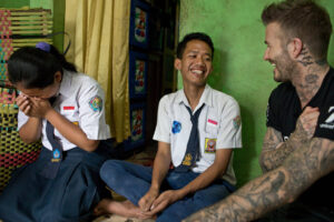 2 school children with David Beckham